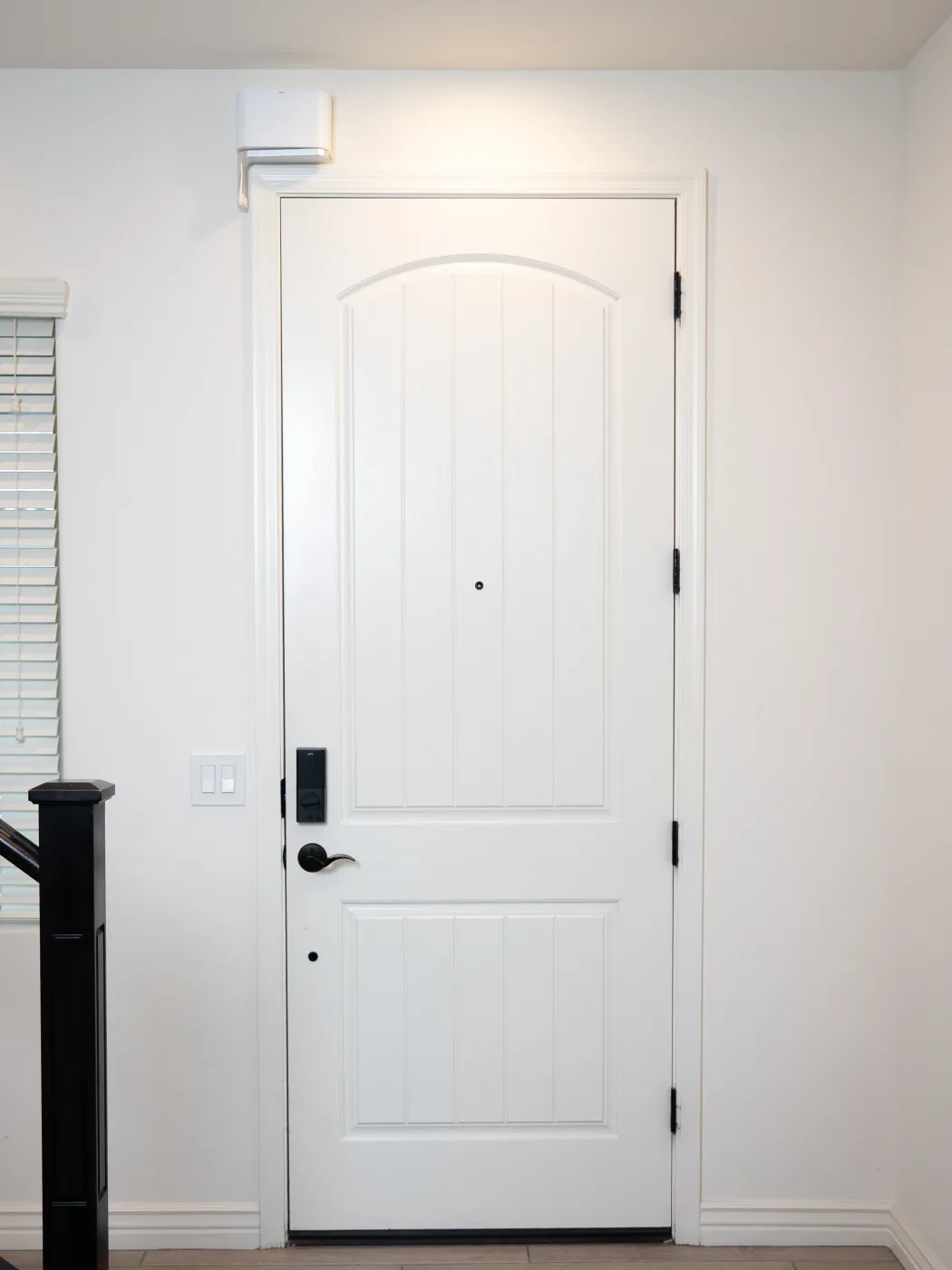 The Guard installed above a front entry door